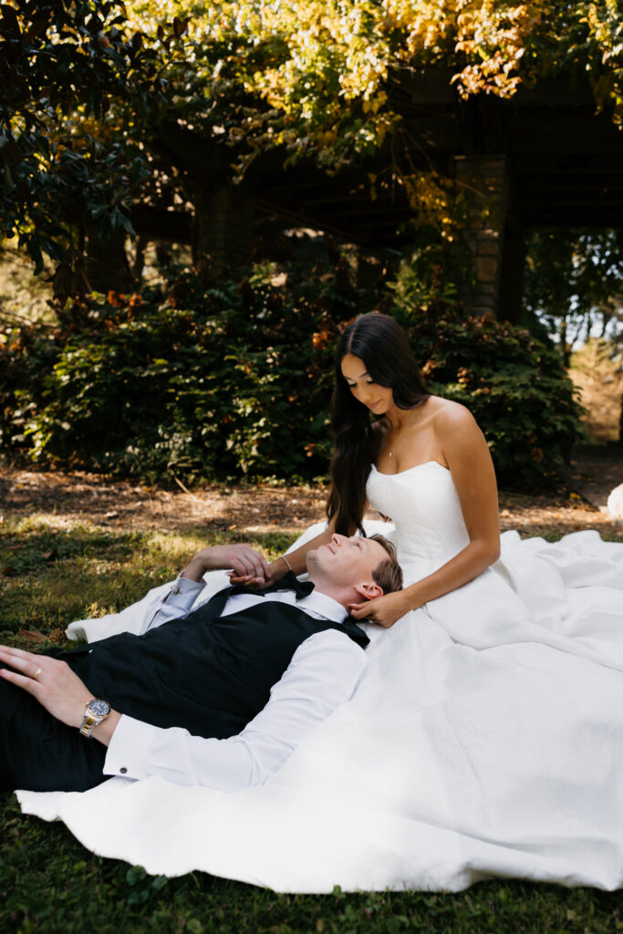 groom laying on bride lap