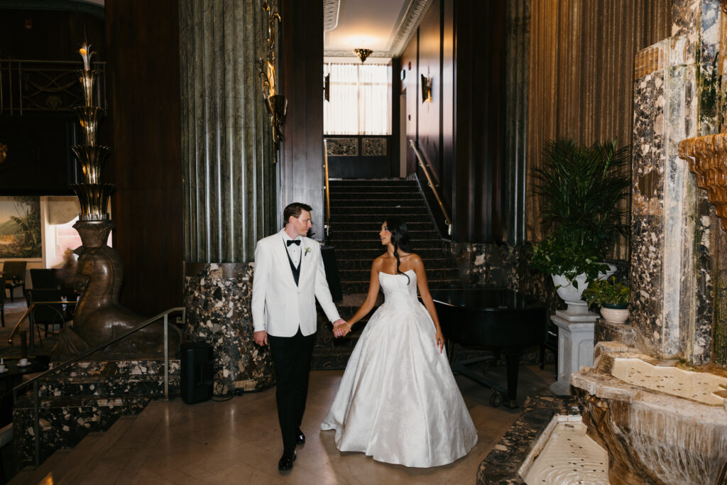 bride and groom in hilton netherland plaza