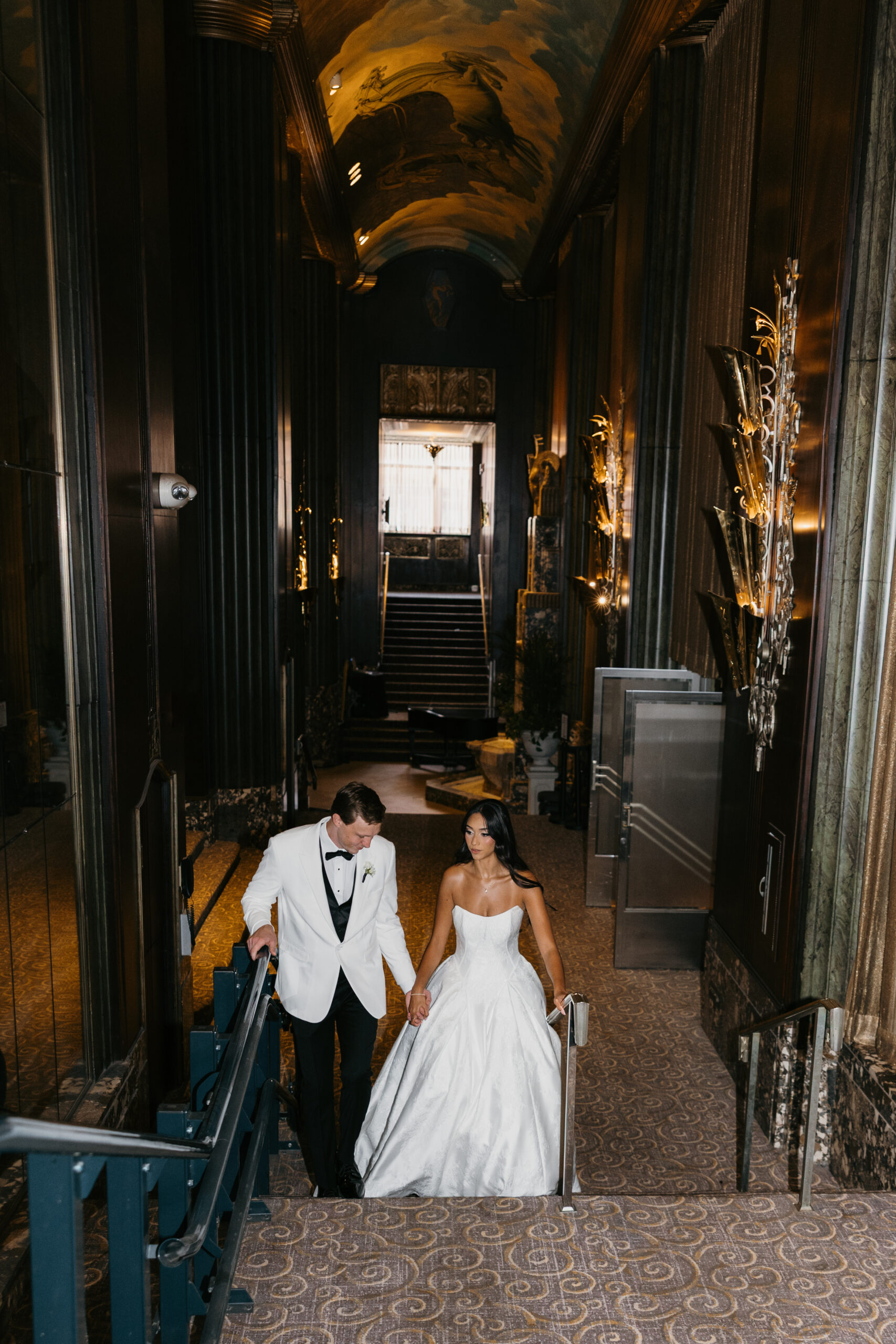 bride and groom in hilton netherland plaza